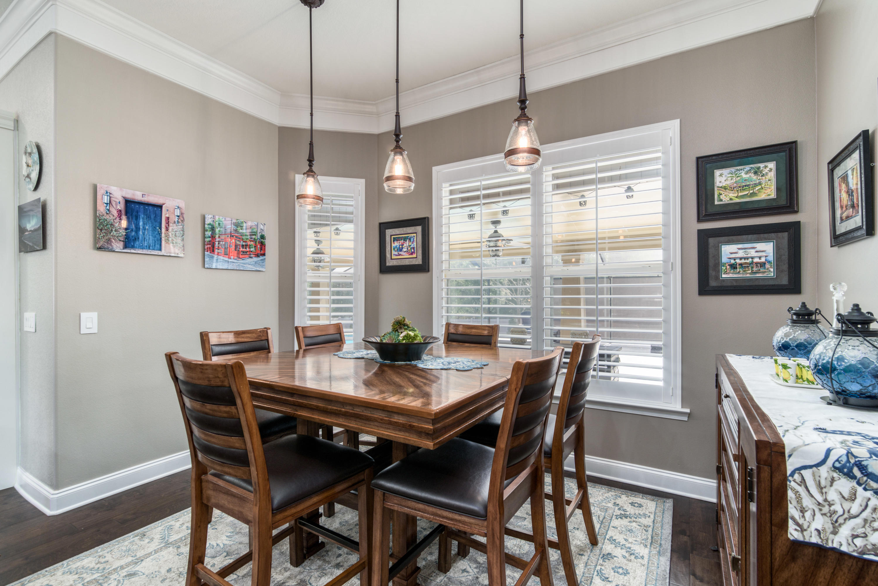 4563 Pfitzer Circle Crestview, FL 32536 - Photo 19 of 79 a view of a dining room with furniture window and wooden floor