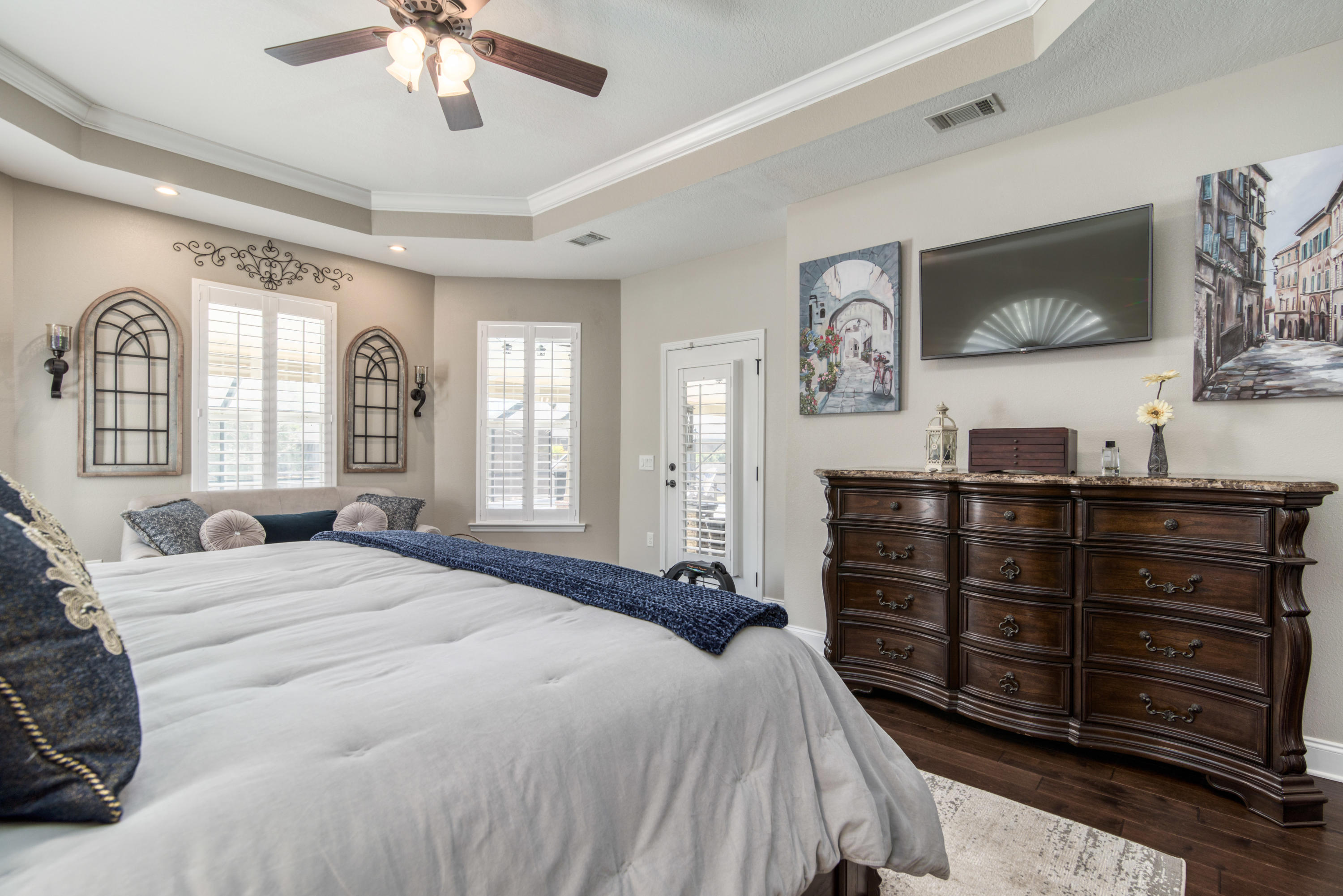 4563 Pfitzer Circle Crestview, FL 32536 - Photo 26 of 79 a bedroom with a bed and a flat screen tv