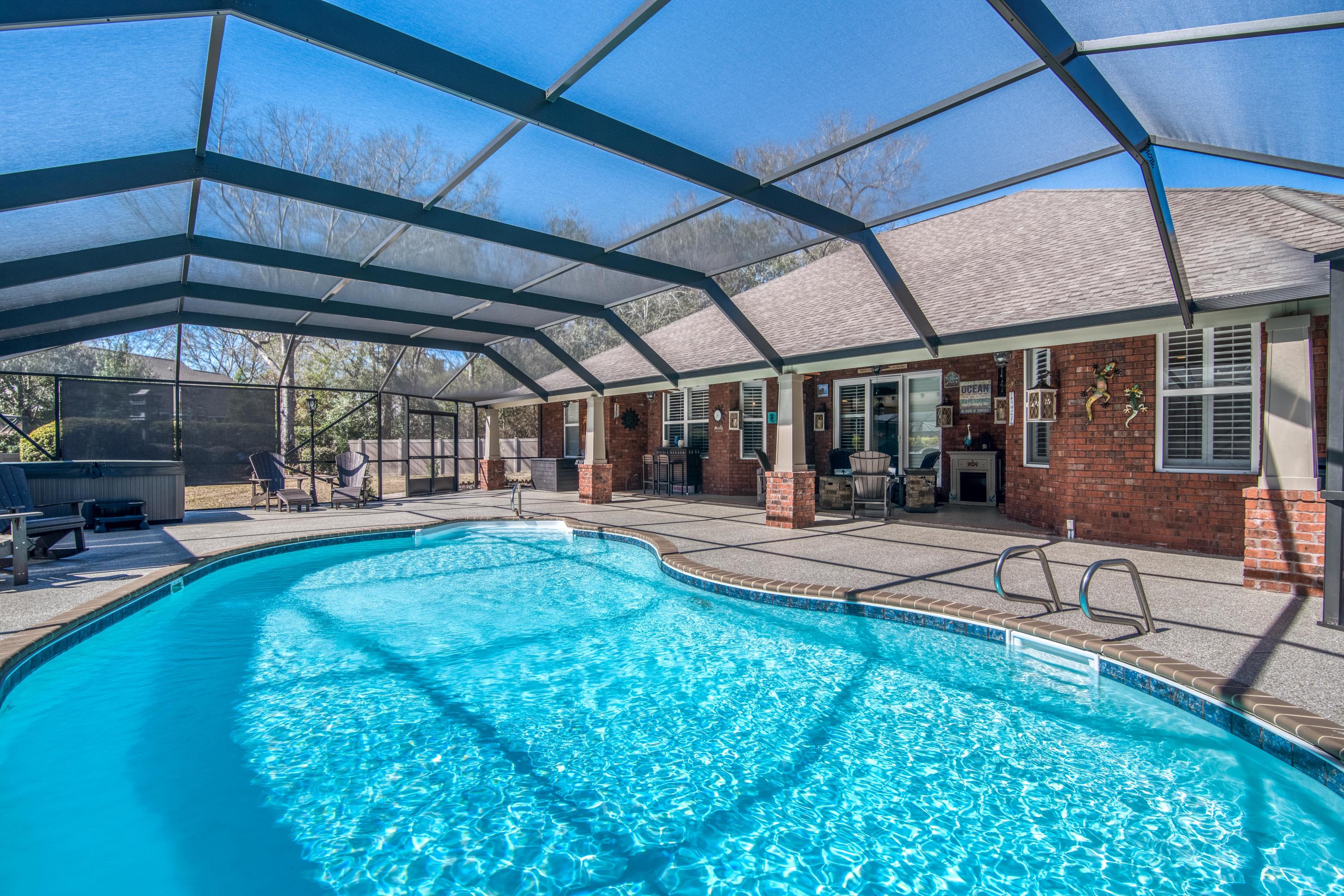 4563 Pfitzer Circle Crestview, FL 32536 - Photo 54 of 79 a view of a swimming pool with a patio