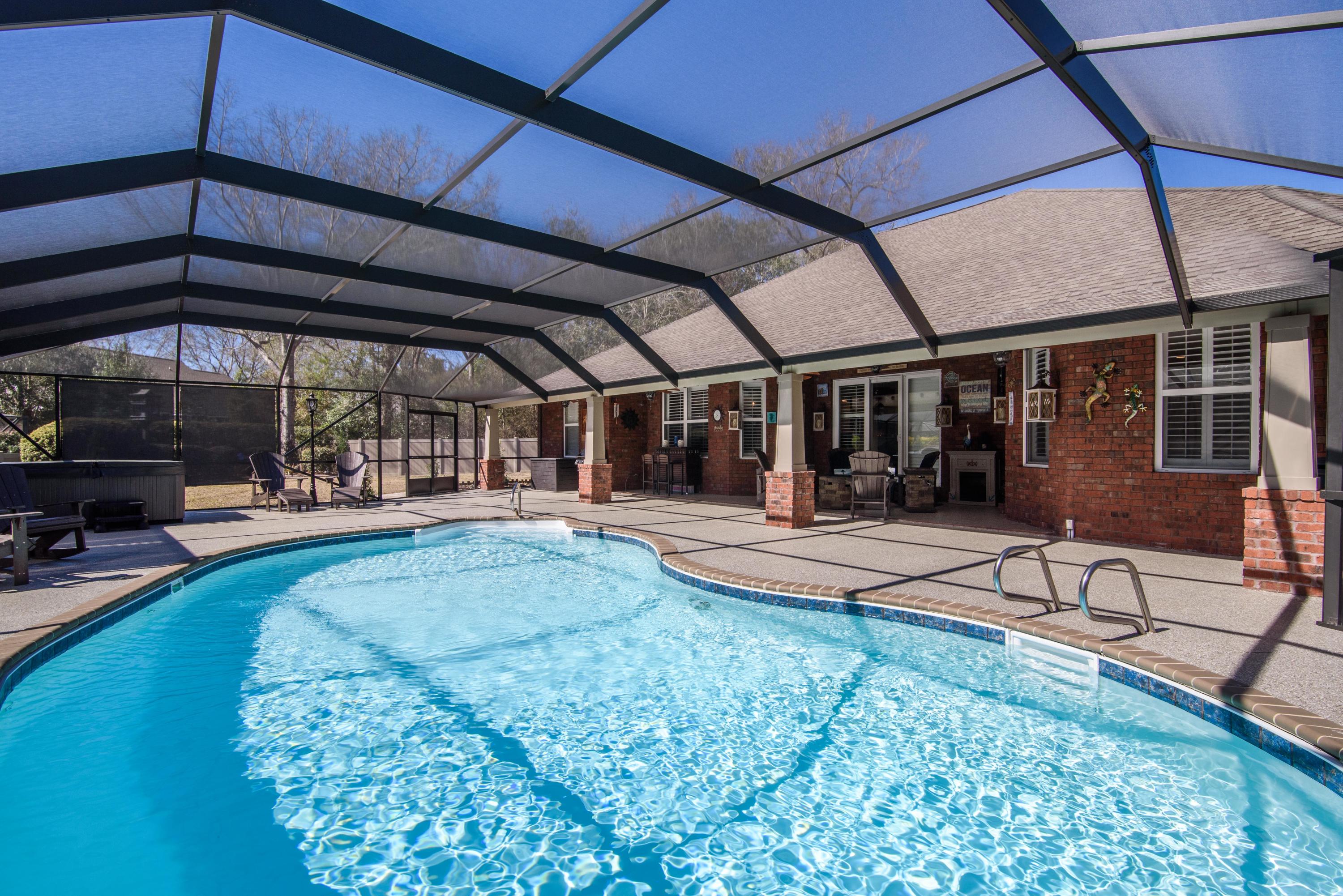 4563 Pfitzer Circle Crestview, FL 32536 - Photo 55 of 79 a view of a backyard with sitting area
