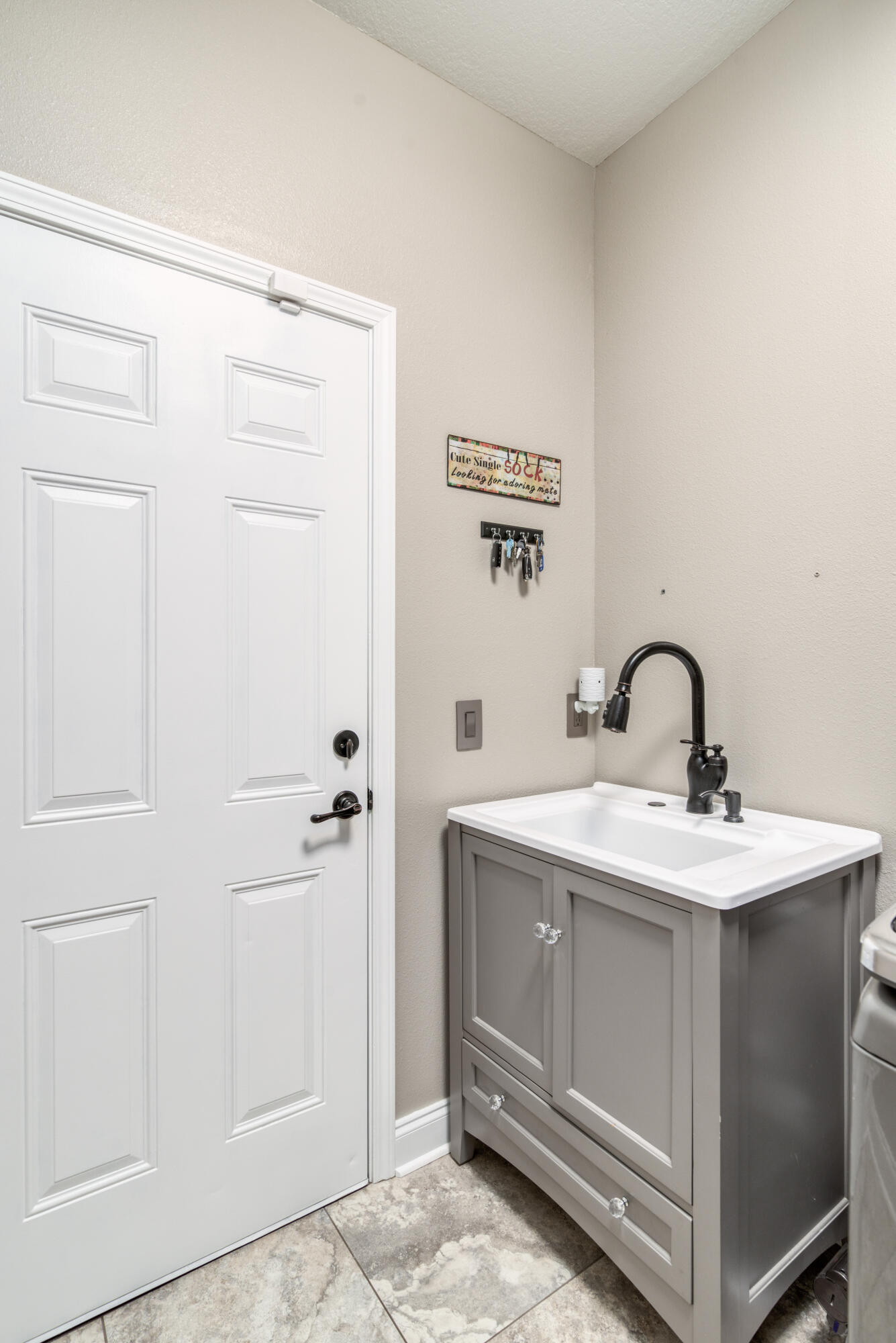 4563 Pfitzer Circle Crestview, FL 32536 - Photo 60 of 79 a bathroom with a sink and mirror