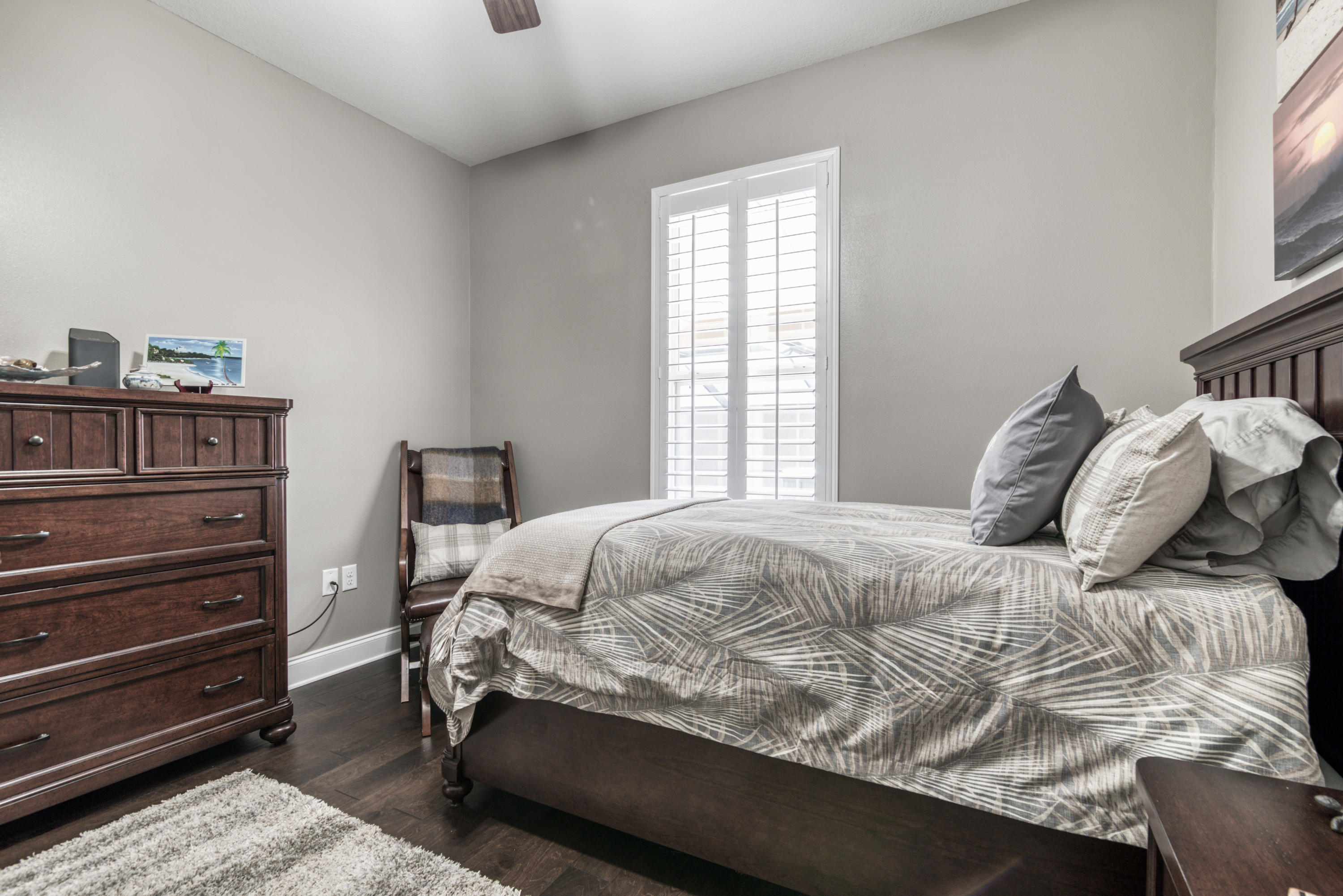 4563 Pfitzer Circle Crestview, FL 32536 - Photo 6 of 79 a bedroom with a bed and a window