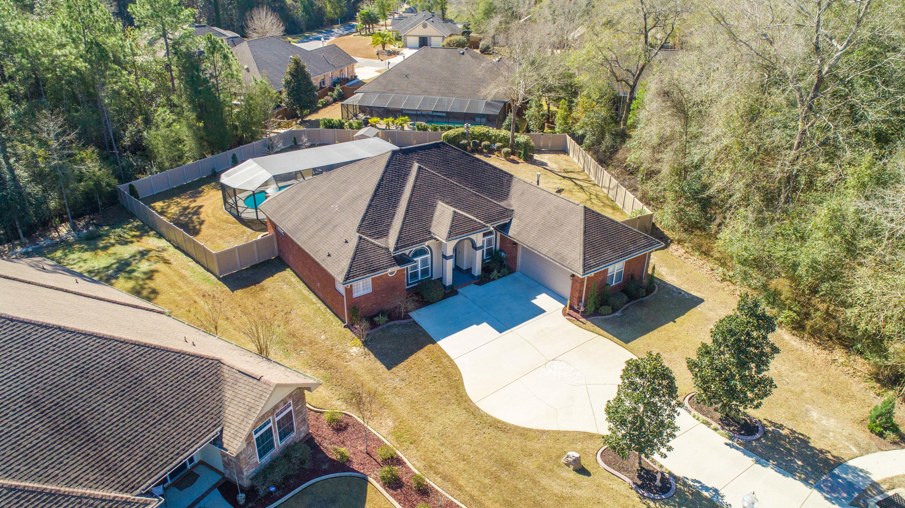 4563 Pfitzer Circle Crestview, FL 32536 - Photo 78 of 79 an aerial view of houses with yard