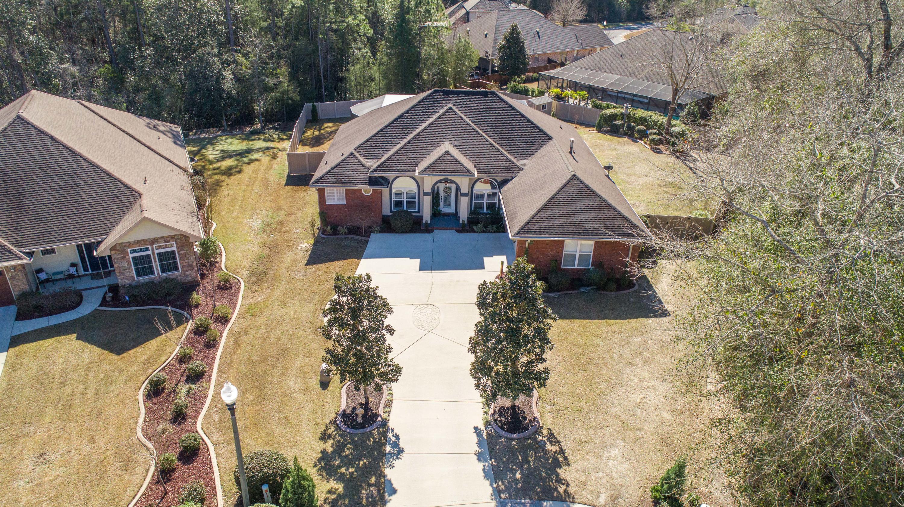 4563 Pfitzer Circle Crestview, FL 32536 - Photo 79 of 79 a aerial view of a house with a yard