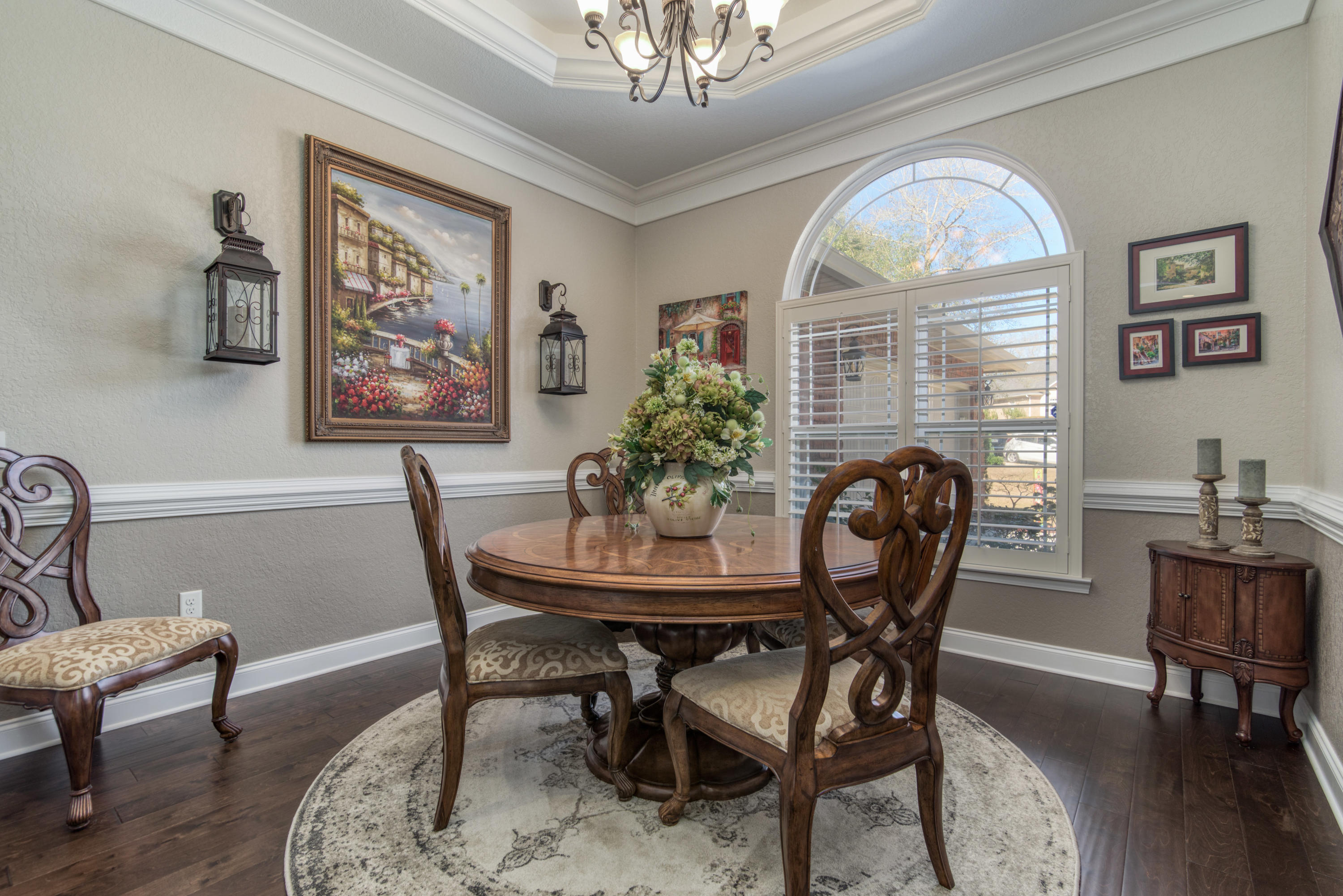 4563 Pfitzer Circle Crestview, FL 32536 - Photo 8 of 79 a view of a dining room with furniture window and wooden floor