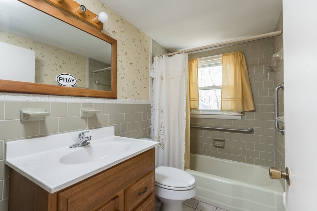 409 Bay Road Easton, MA 02375 - Photo 14 of 26 a bathroom with a sink toilet and shower