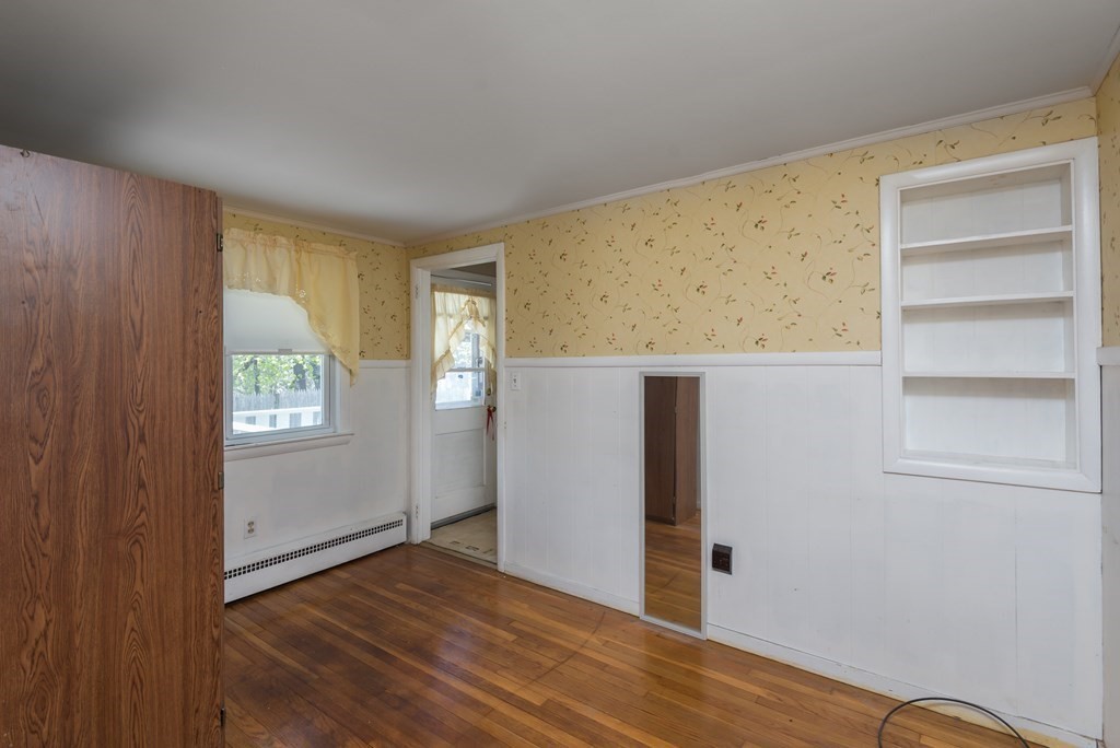409 Bay Road Easton, MA 02375 - Photo 17 of 26 a view of an empty room with closet and a window