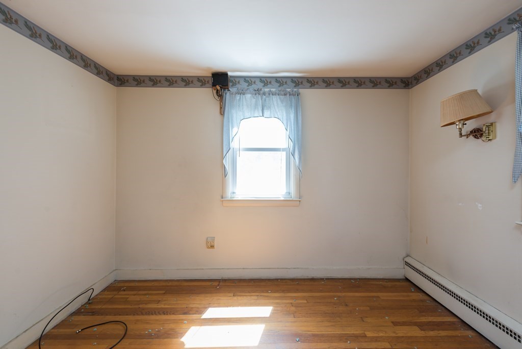 409 Bay Road Easton, MA 02375 - Photo 20 of 26 a view of a room with wooden floor and natural light
