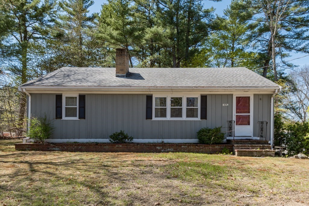 409 Bay Road Easton, MA 02375 - Photo 3 of 26 a front view of a house with a yard