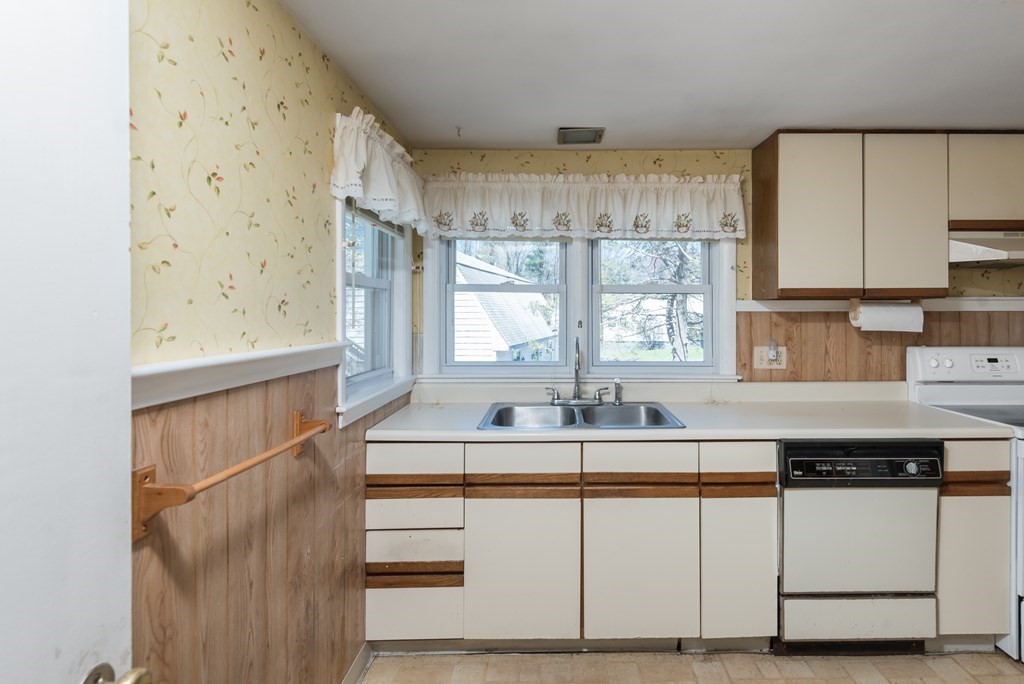 409 Bay Road Easton, MA 02375 - Photo 9 of 26 a kitchen with stainless steel appliances granite countertop a sink and a cabinets