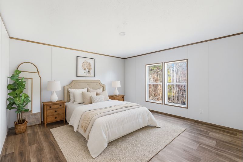 149 Newton Road Pickens, SC 29671 - Photo 3 of 29 This tranquil bedroom features ample natural light and durable flooring for comfortable living.