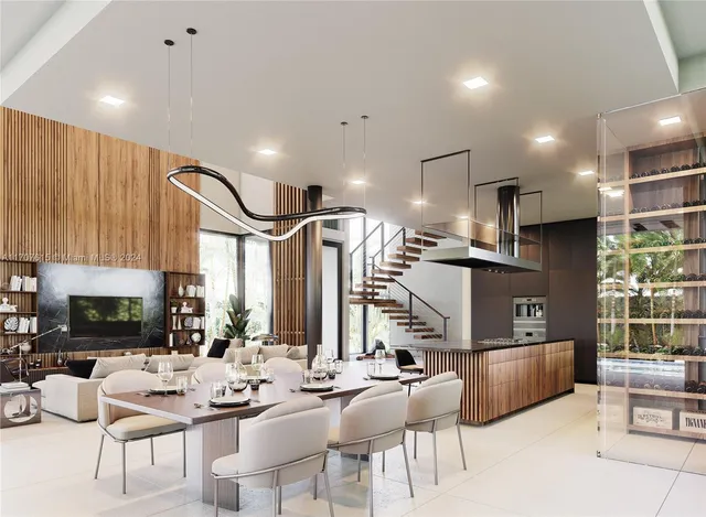 a room with stainless steel appliances lots of white furniture a window and a kitchen view