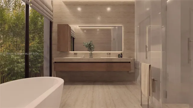 a bathroom with a bathtub and a mirror