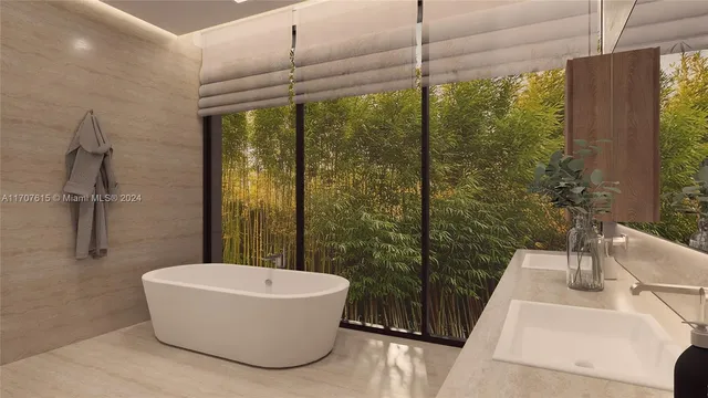 a bathroom with a bathtub and shower