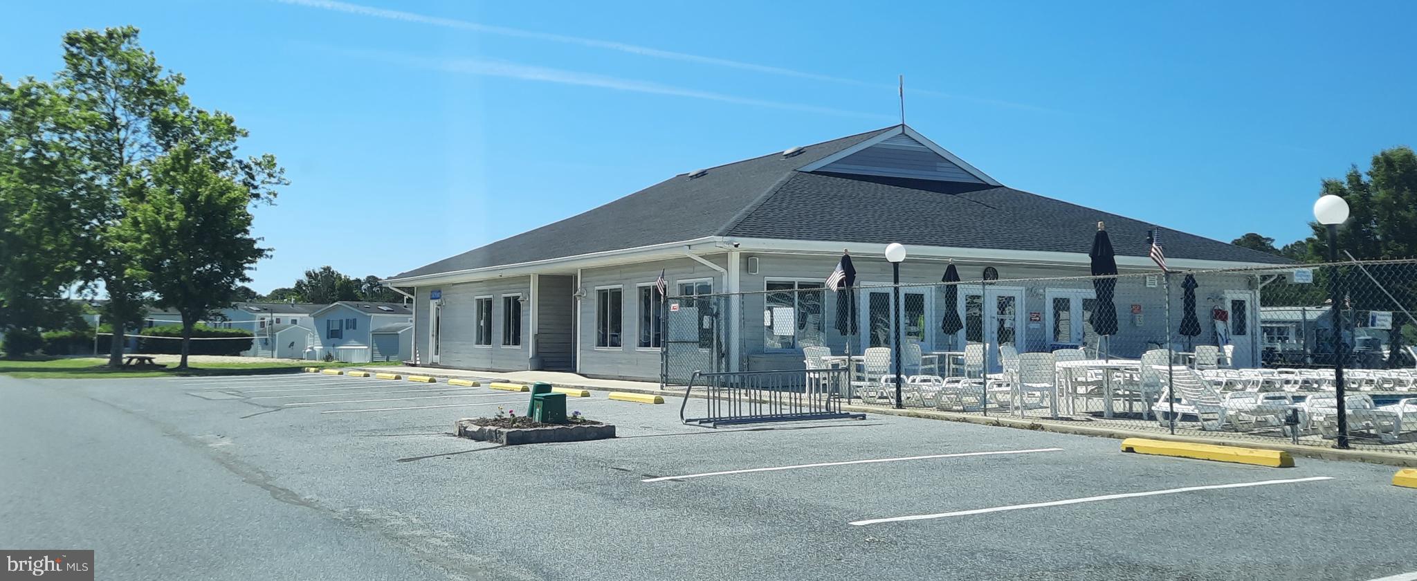12412 Windlass Way Berlin, MD 21811 - Photo 103 of 105 a view of a house with swimming pool and sitting area