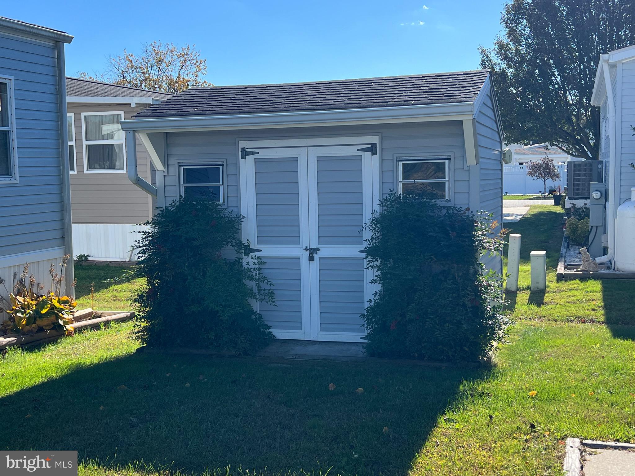 12412 Windlass Way Berlin, MD 21811 - Photo 4 of 105 a view of a house with a yard