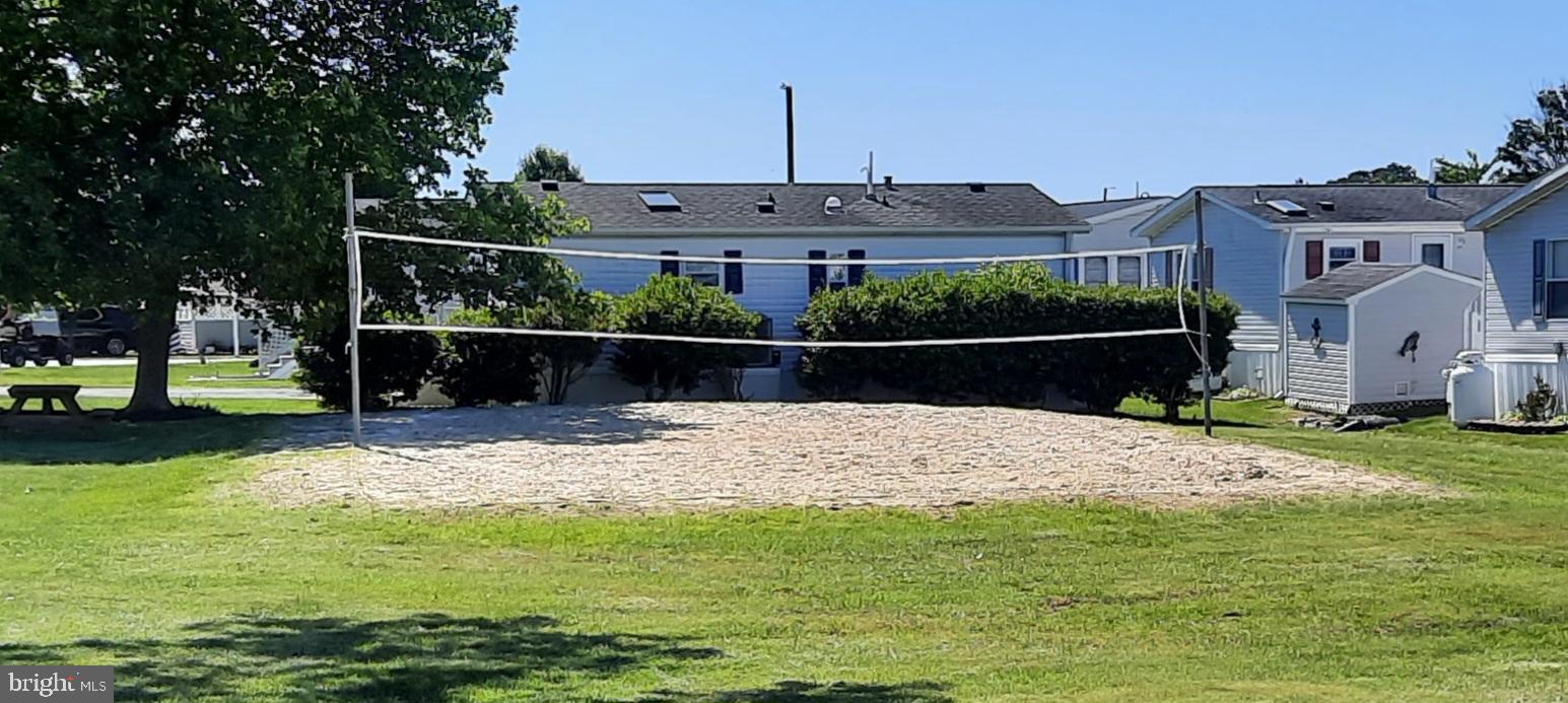 12412 Windlass Way Berlin, MD 21811 - Photo 87 of 105 a front view of a house with a yard