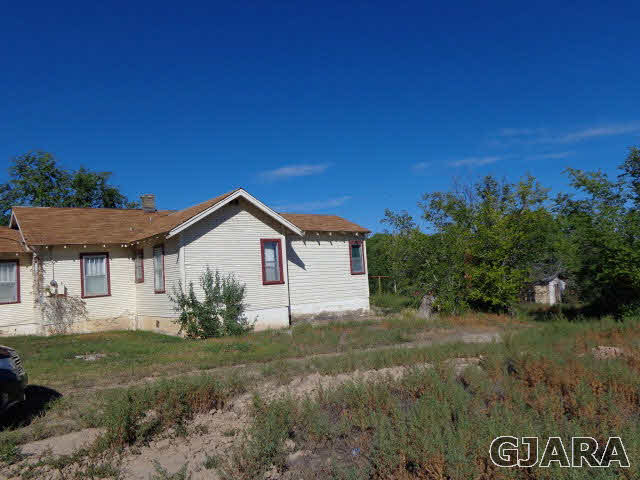 2756 B Road Grand Junction, CO 81503 - Photo 4 of 8 a house view with a garden space