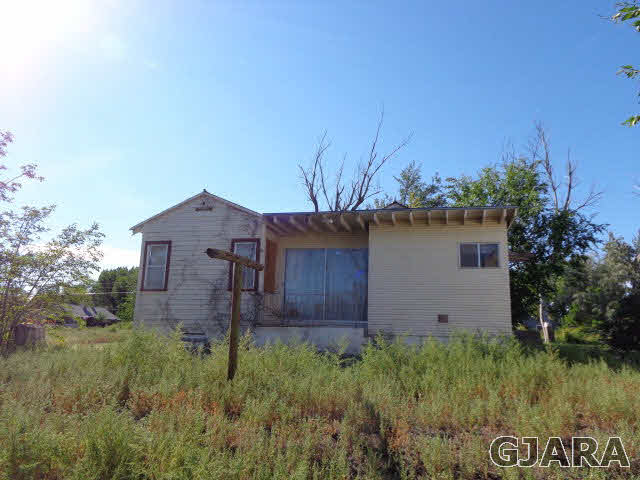 2756 B Road Grand Junction, CO 81503 - Photo 8 of 8 a view of a house with a yard and plants