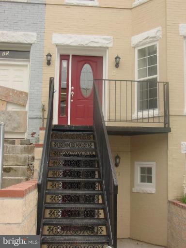 13 S Street Northeast, Unit A Washington, DC 20002 - Photo 1 of 8 front view of a house with a window