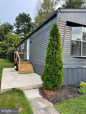 a view of a back yard of the house