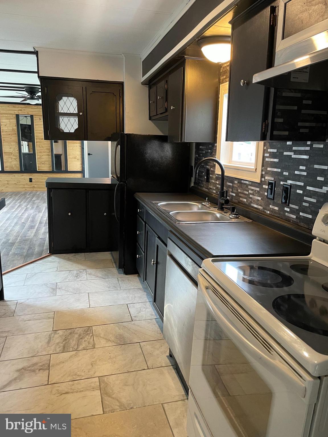 321 Lewis Road Annville, PA 17003 - Photo 9 of 30 a kitchen with a stove and a sink