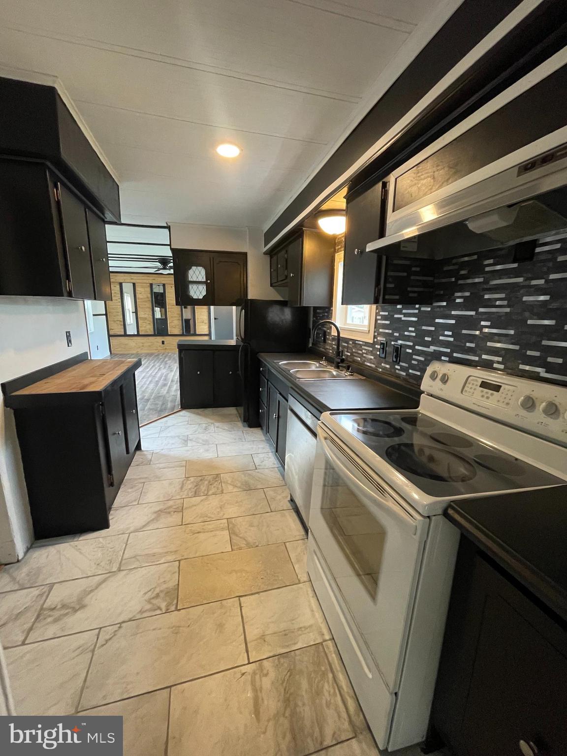 321 Lewis Road Annville, PA 17003 - Photo 10 of 30 a kitchen with a stove and a refrigerator