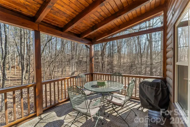 a view of balcony with furniture