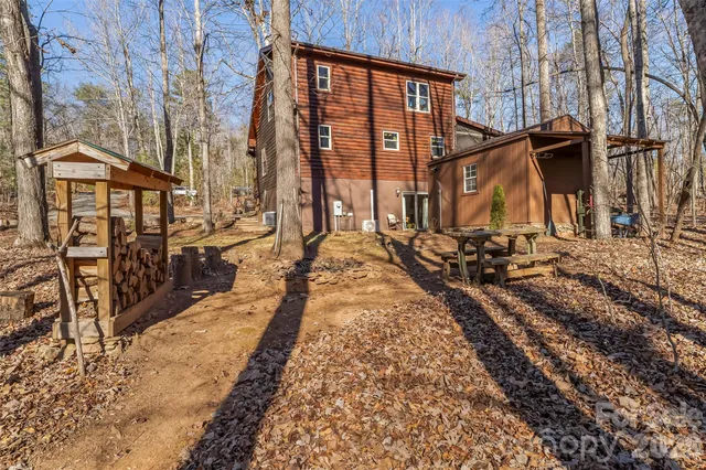 a living room with lots of furniture and a flat screen tv