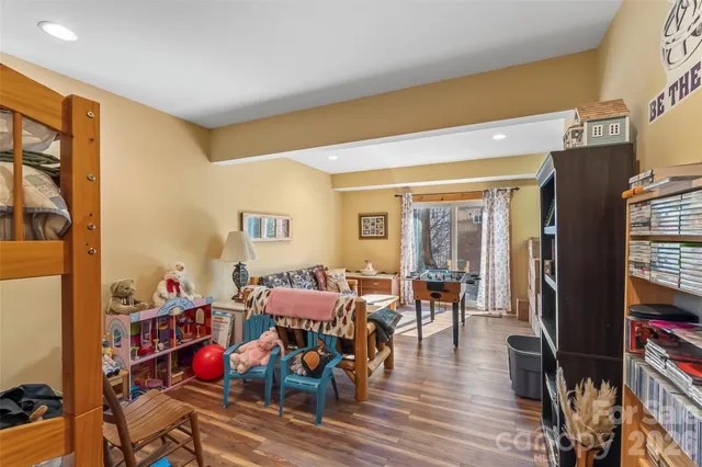 a bathroom with a toilet a sink and a mirror