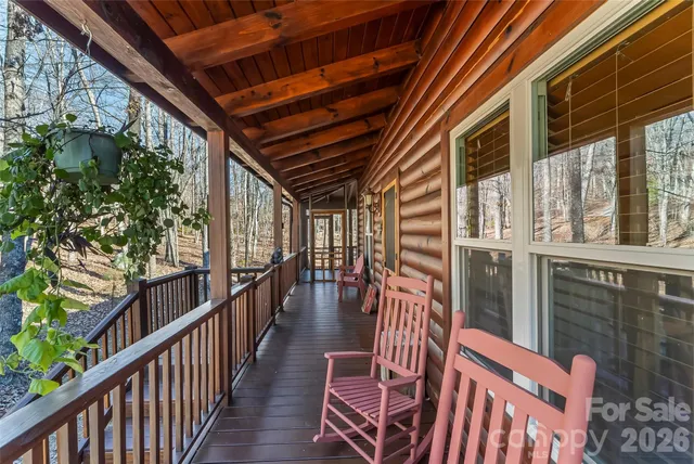 a view of an chairs and table in the balcony