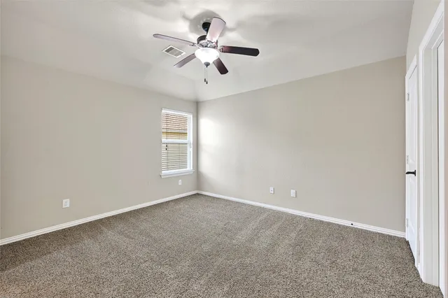 a bathroom with a double vanity sink mirror and shower