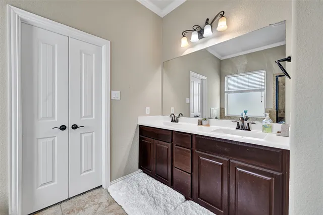 a bathroom with a bathtub and shower
