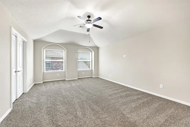 a bathroom with a double vanity sink and mirror