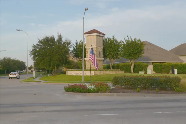 a view of a lake with a houses