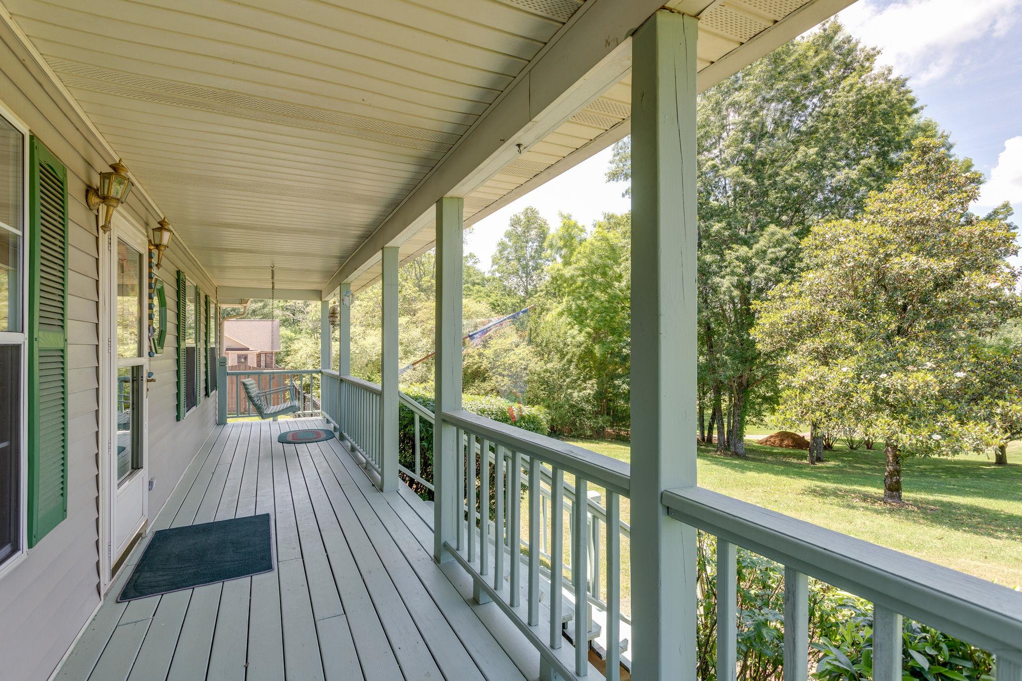1819 Seavy Hight Road Columbia, TN 38401 - Photo 4 of 30 Enjoy this park-like setting from your Full Covered Front Porch. Beautifully wooded grounds provide shady comfort.