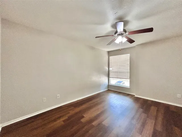 a view of an empty room with window