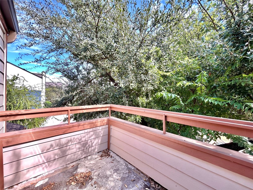 7111 East Highway 290, Unit C Austin, TX 78723 - Photo 19 of 20 a view of balcony with wooden floor