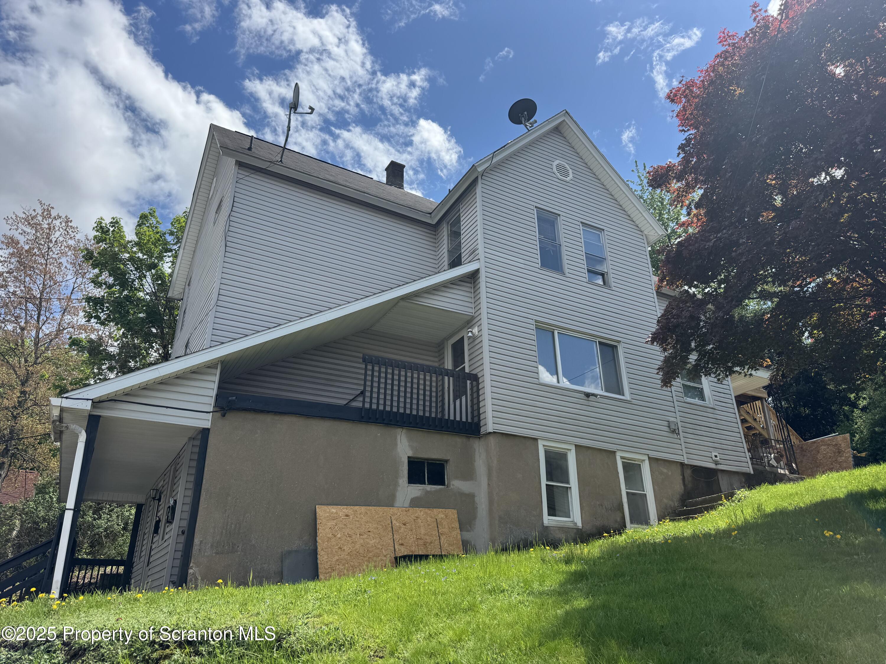627 South Blakely Street Scranton, PA 18510 - Photo 13 of 13 a front view of a house with a yard