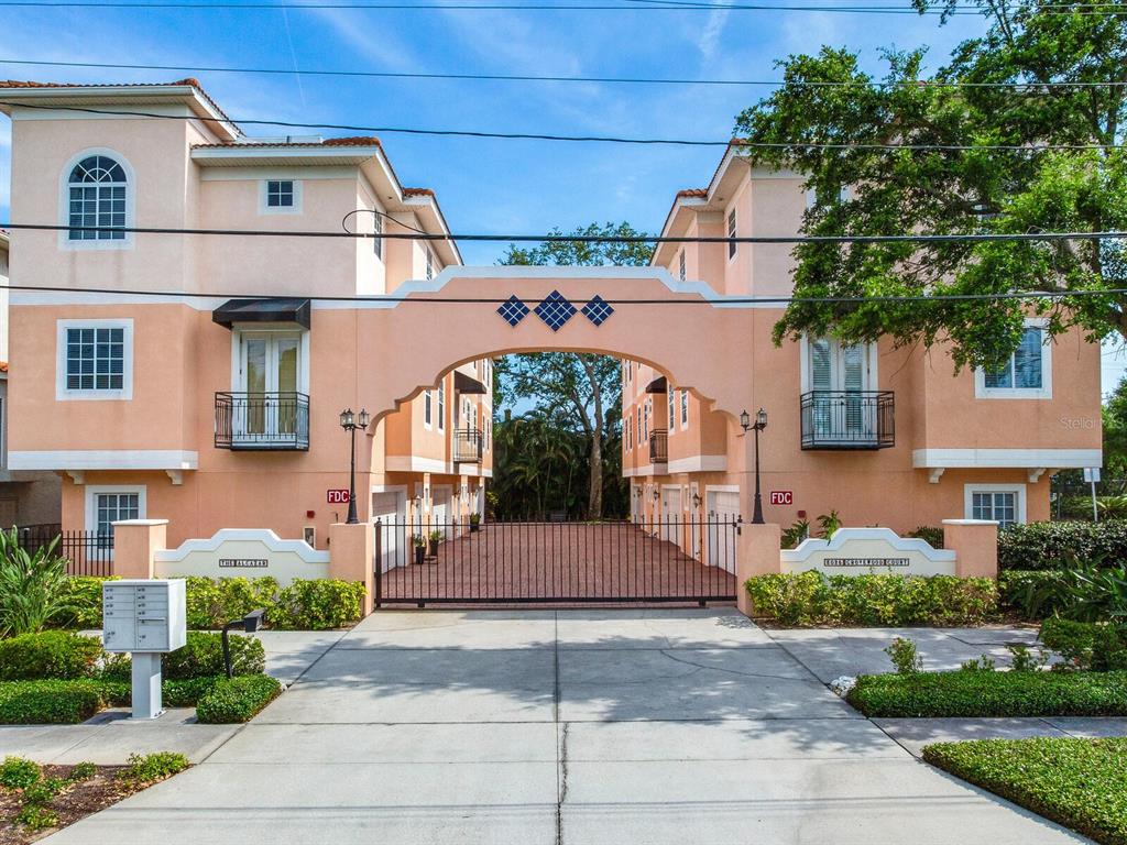 3025 West Grovewood Court, Unit 4C Tampa, FL 33629 - Photo 1 of 43 front view of a house with a street