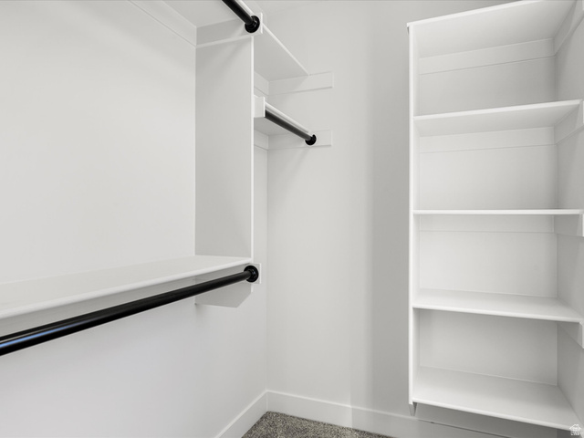 1159 North Broad Hollow Road Garden City, UT 84028 - Photo 46 of 55 Custom closet system featuring white shelving and black hanging rods