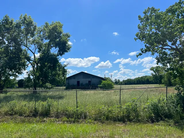 a view of a lake from a yard