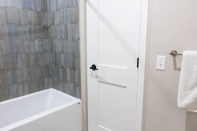 a bathroom with a bathtub
