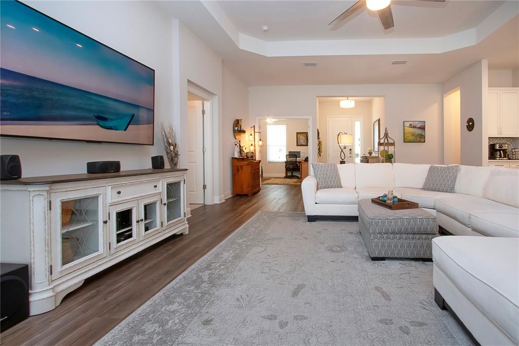 4304 Fly Rod Terrace Parrish, FL 34219 - Photo 16 of 97 a living room with furniture and a fireplace