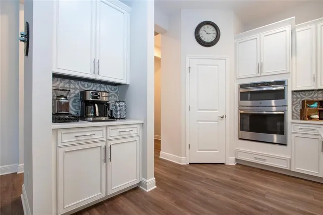 a bathroom with a double vanity sink double and mirror