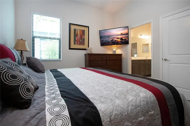 a view of a house with swimming pool yard and sitting area