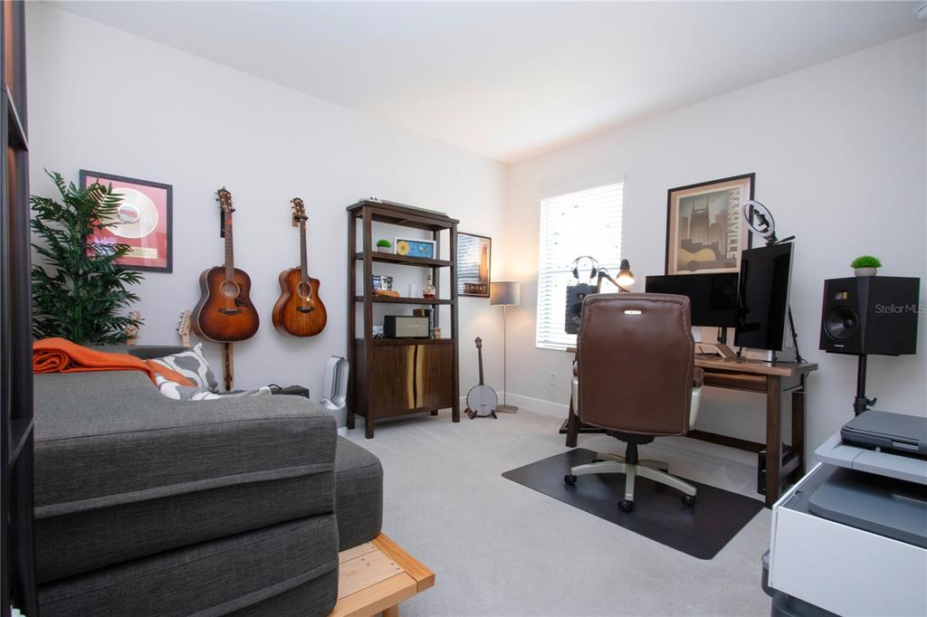 4304 Fly Rod Terrace Parrish, FL 34219 - Photo 52 of 97 a view of a workspace with furniture and a window