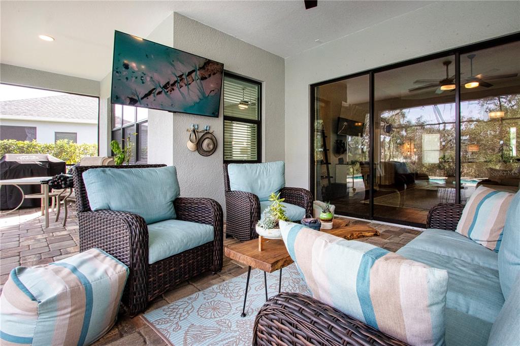 4304 Fly Rod Terrace Parrish, FL 34219 - Photo 58 of 97 a living room with furniture and a large window