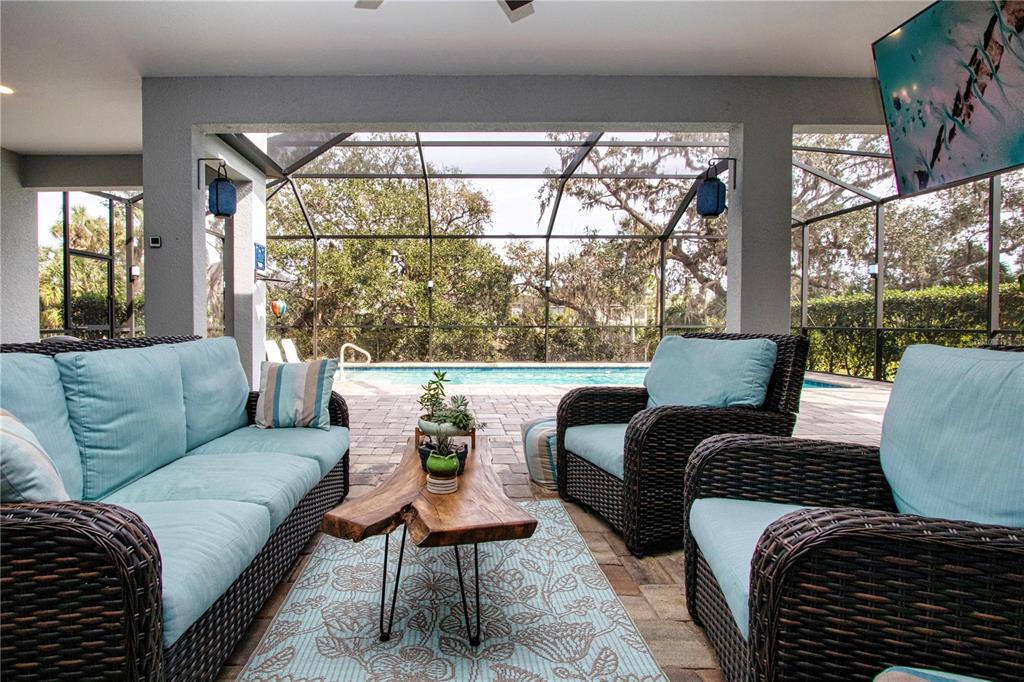 4304 Fly Rod Terrace Parrish, FL 34219 - Photo 59 of 97 a living room with furniture and a large window