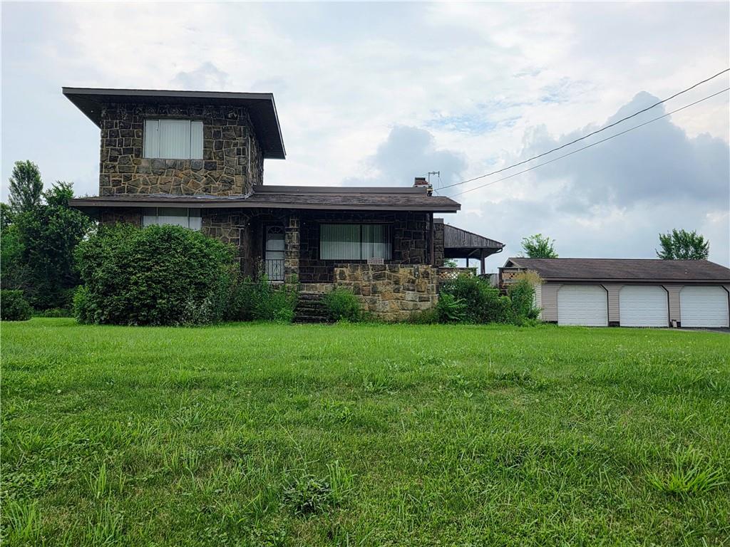 1356 Connellsville Road Lemont Furnace, PA 15456 - Photo 2 of 29 a view of a house with backyard and garden